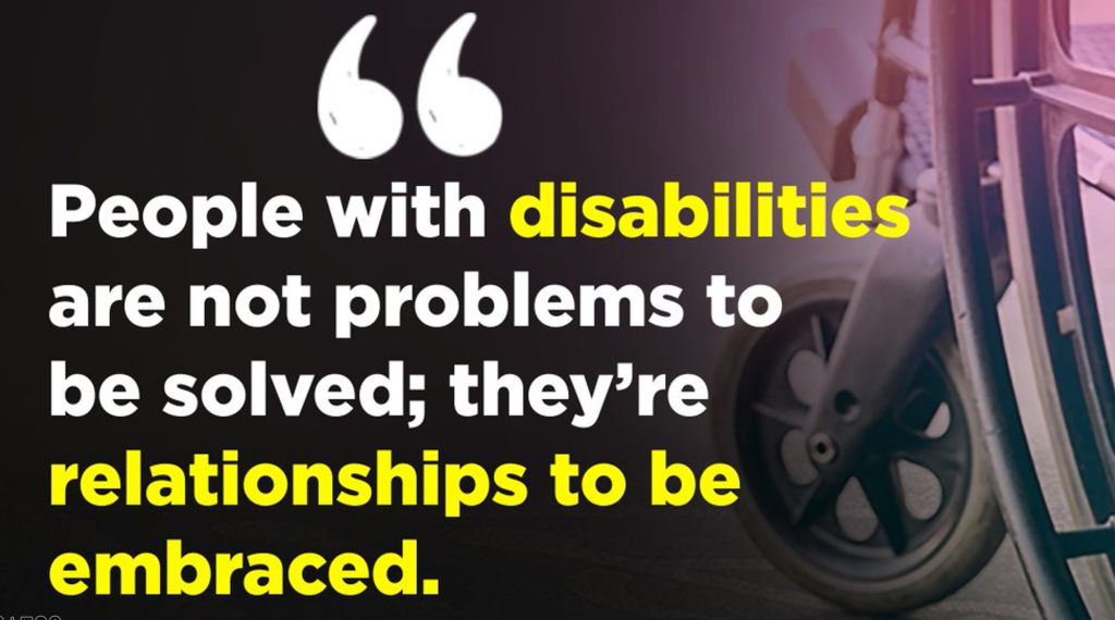 A poster with a quote: "People with disabilities are not problems to be solved; they're relationships to be embraced."